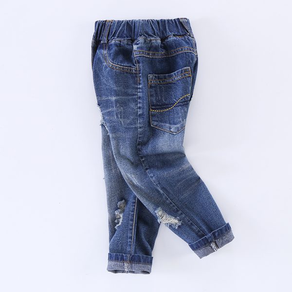 ⁦Ripped children's jeans⁩ - الصورة ⁦2⁩