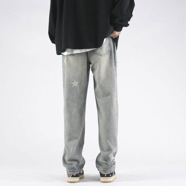 ⁦XINGX Printed Yellow Mud Dyed Ripped Jeans For Men⁩ - الصورة ⁦3⁩