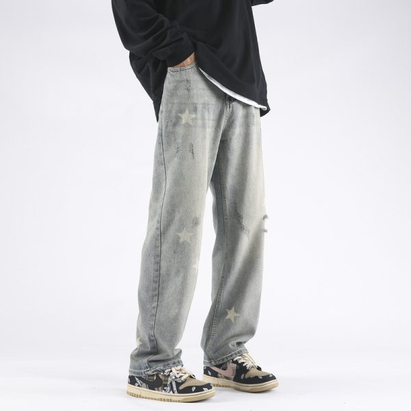 ⁦XINGX Printed Yellow Mud Dyed Ripped Jeans For Men⁩ - الصورة ⁦2⁩